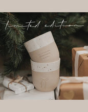Laden Sie das Bild in den Galerie-Viewer, Becher Limited Edition All I Want for Christmas von Eulenschnitt aus handgefertigtem Steingut mit Schriftzug „All I want for Christmas is you“, 8,5 × 9,5 cm, ca. 320 ml, spülmaschinenfest und mikrowellengeeignet.