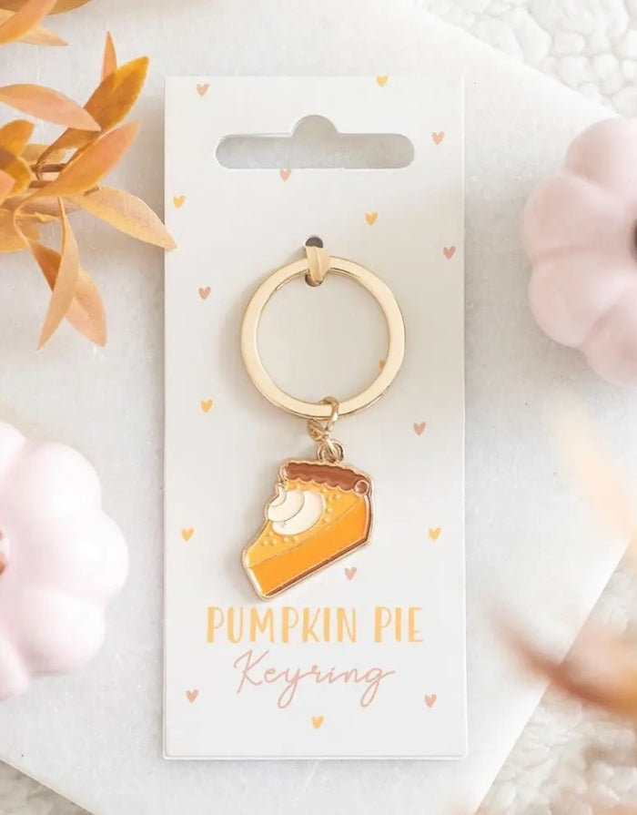 Kürbiskuchen-Schlüsselanhänger von Something Different im verspielten Pumpkin-Pie-Design als herbstliches Accessoire für Schlüssel und Taschen.