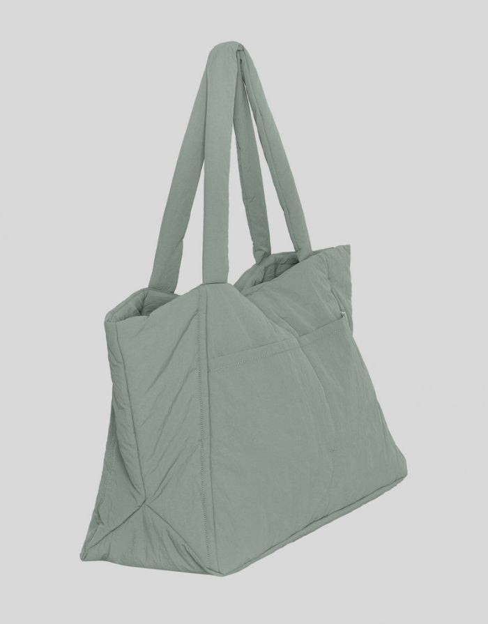 MSCH Copenhagen Tasche Siria Sasja Icon Laurel Wreath in Grün als gesteppter Shopper mit gepolsterten Griffen.