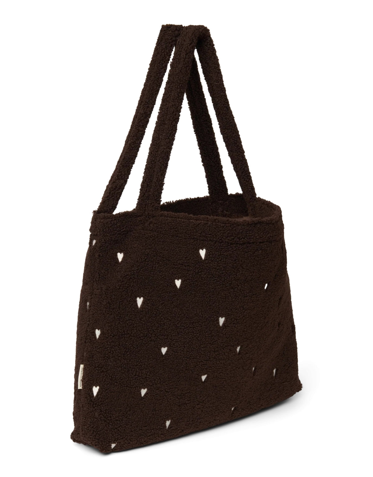 Schokoladenbraune Mom Bag Chocolate Teddy Hearts von Studio Noos aus weichem Teddy-Material mit gestickten Herzen und langen Tragehenkeln.