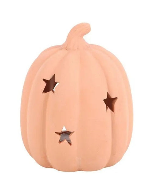 Terrakotta Kürbis-Teelichthalter von Something Different mit ausgestanzten Sternen für eine stimmungsvolle Herbst- und Halloween-Dekoration als Freisteller