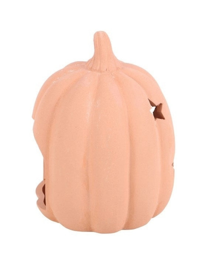 Terrakotta Kürbis-Teelichthalter von Something Different mit ausgestanzten Sternen für eine stimmungsvolle Herbst- und Halloween-Dekoration von der anderen Seite