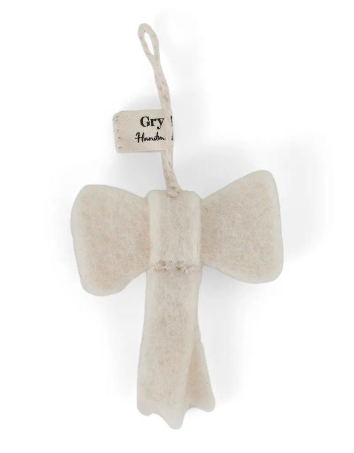 Handgefilzte Mini-Schleife in Beige aus Wolle von Én Gry & Sif – natürliche Fair-Trade-Weihnachtsdeko, perfekt für Baum, Geschenk oder Tischdekoration.