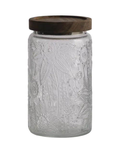 Vorratsglas Kalle Flower/Brown von Affari of Sweden aus klarem Glas mit braunem Akazienholzdeckel und 1000 ml Fassungsvermögen.