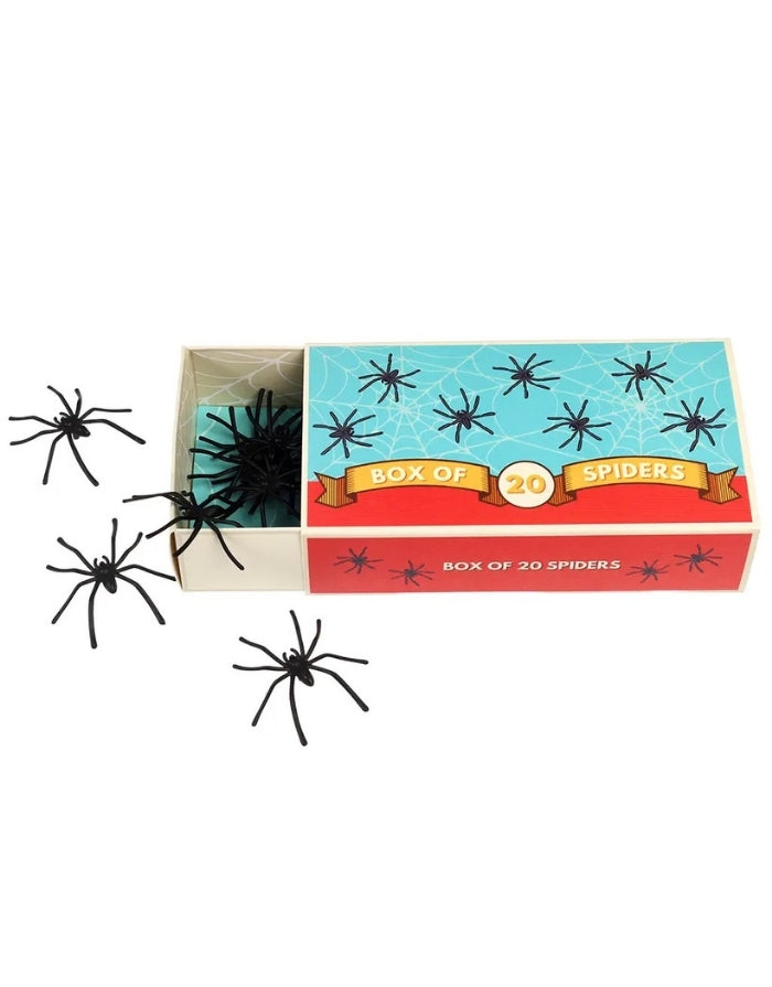 Set mit 20 schwarzen Deko-Spinnen von Rex London aus Kunststoff für Halloween-Partys und gruselige Dekorationen neben Verpackung
