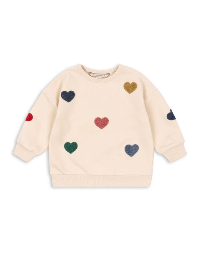 Beiges Lou Sweatshirt aus Bio-Baumwolle von Konges Sløjd mit bunten Herzapplikationen.