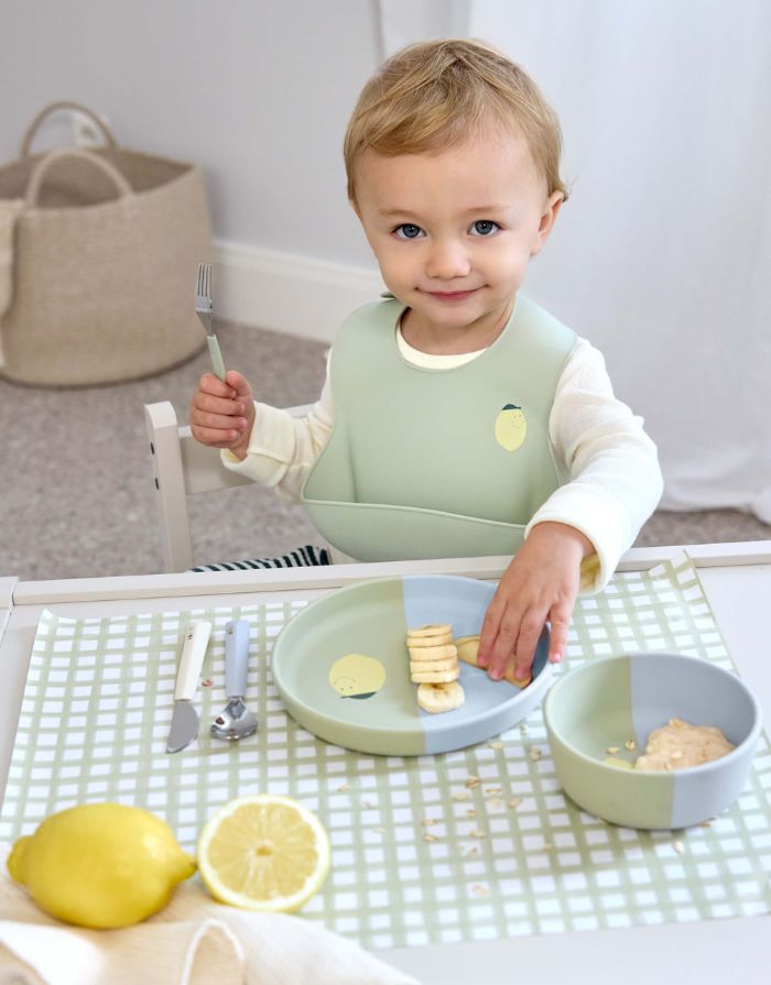 Blaue und grün Kinderschale aus Silikon mit Zitronenmotiv, BPA-frei, flexibel, mikrowellen- und spülmaschinengeeignet, ideal für Babys ab 6 Monaten.