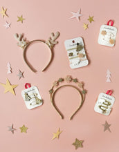 Laden Sie das Bild in den Galerie-Viewer, Golden Reindeer - Festliche Rockahula Weihnachts-Haaraccessoires mit glitzernden Details und fröhlichen Farben – liebevoll gestaltet für kleine und große Winterträume.
