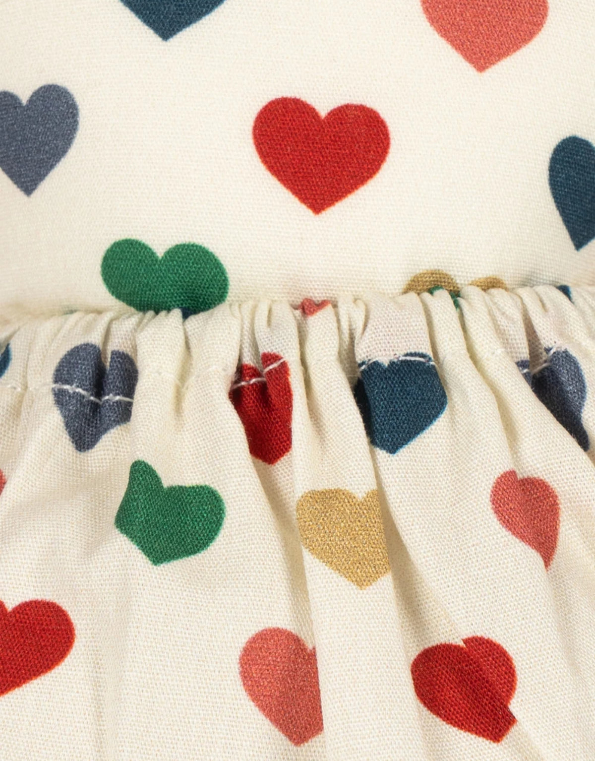 Mini Doll Coeur Coloré von Konges Sløjd, 21 cm große Puppe mit weichem Stoffkörper und liebevoll gestaltetem Puppenkleid, Stoff.