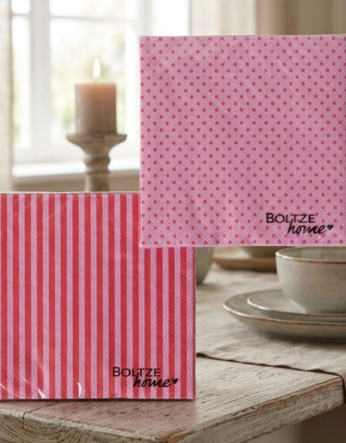 Servietten Ladina von BOLTZE im 20er-Set mit gepunkteten und gestreiften Designs in Rosa, Rot und weiteren Farbtönen.