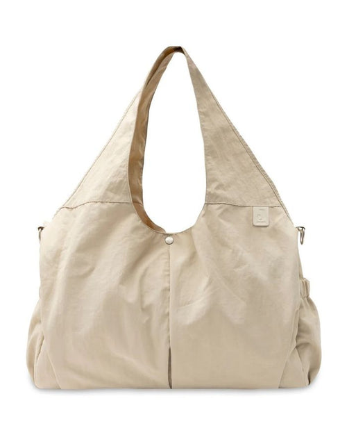 Jollein Urban Wickeltasche mit wasserabweisender Oberfläche und vielen praktischen Fächern.