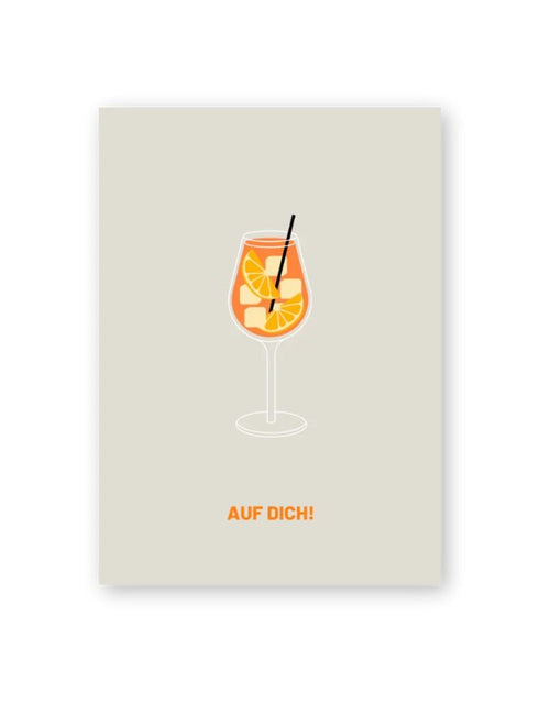 Postkarte von Herr und Frau Hempel aus hochwertiger Holzschliffpappe im DIN-A6-Format mit der Aufschrift auf dich und einem Glas mit Aperol