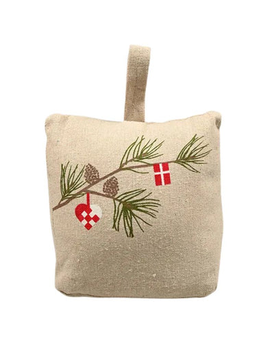 Türstopper von Det Gamle Apotek – dekorativer Türstopper in beige.