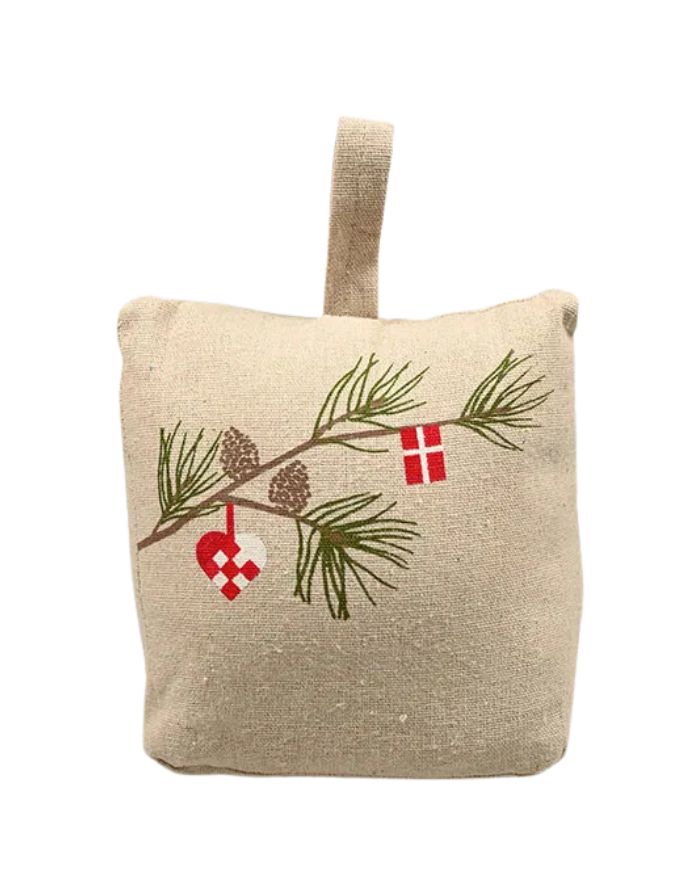 Türstopper von Det Gamle Apotek – dekorativer Türstopper in beige.