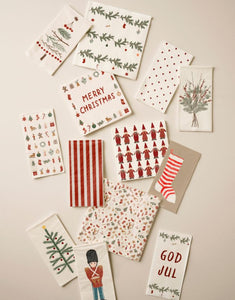 Papierserviette mit Weihnachtsbaum-Motiv, ideal für festliche Tischdekoration.