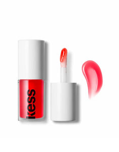 Kess Berlin Lip Oil in transparentem Glasflakon mit schwarzem Deckel – feuchtigkeitsspendendes Pflegeprodukt für glänzende Lippen