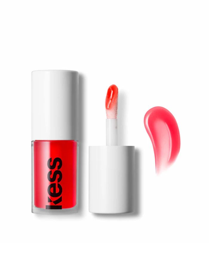 Kess Berlin Lip Oil in transparentem Glasflakon mit schwarzem Deckel – feuchtigkeitsspendendes Pflegeprodukt für glänzende Lippen