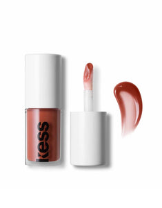 Kess Berlin Lip Oil in transparentem Glasflakon mit schwarzem Deckel – feuchtigkeitsspendendes Pflegeprodukt für glänzende Lippen