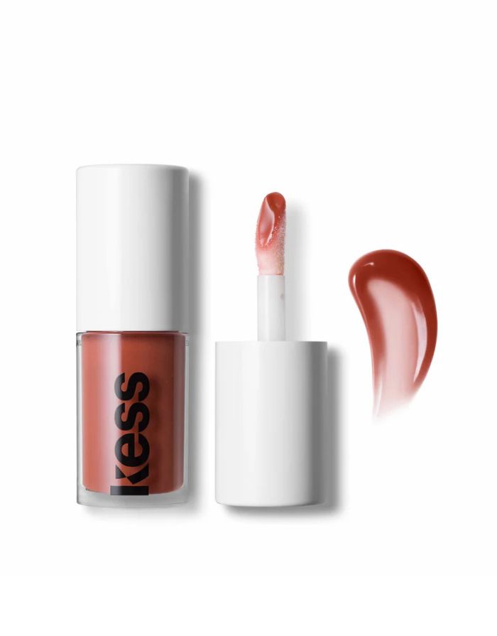 Kess Berlin Lip Oil in transparentem Glasflakon mit schwarzem Deckel – feuchtigkeitsspendendes Pflegeprodukt für glänzende Lippen