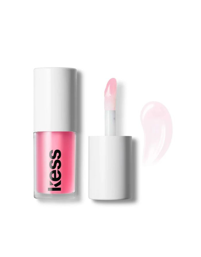 Kess Berlin Lip Oil in transparentem Glasflakon mit schwarzem Deckel – feuchtigkeitsspendendes Pflegeprodukt für glänzende Lippen